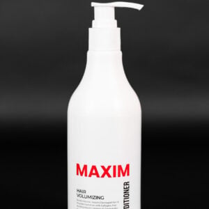 A white bottle of Maxim hair volumizing conditioner with a white pump top is centered against a black background. The word "MAXIM" is printed in large red letters on the bottle. Below that, the words "HAIR VOLUMIZING" are printed in black. A description of the product is printed below that. The word "CONDITIONER" is printed vertically in black on the right side of the bottle. The bottle is standing upright.